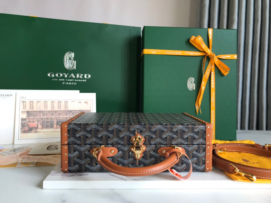 GRAND HÔTEL TRUNK BAG 24 IN BLACK GOYARDINE CANVAS AND TAN CALFSKIN